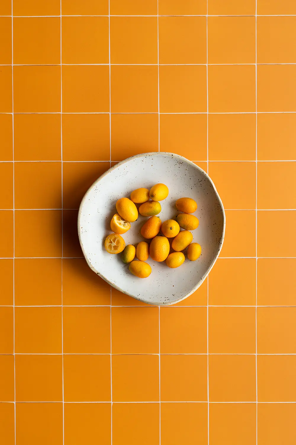 Helder oranje tegel backdrop voor brand shoots en food fotografie